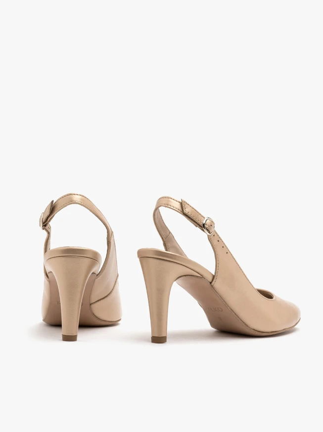 Gold slingback pumps