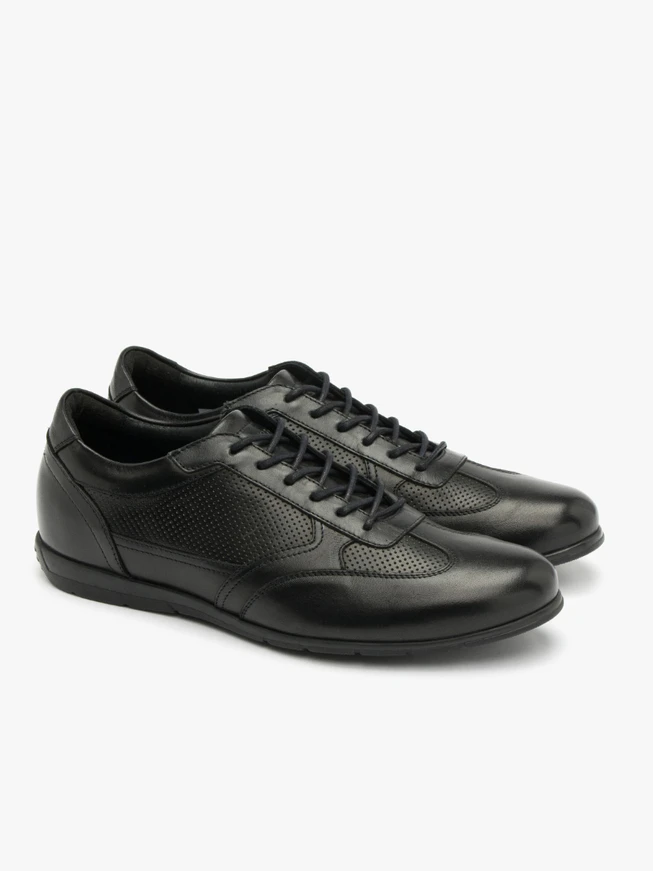 Black perforated shoes with decorative upper