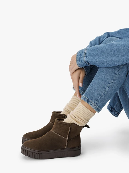 Dunkelgrüne kurze Schneestiefel