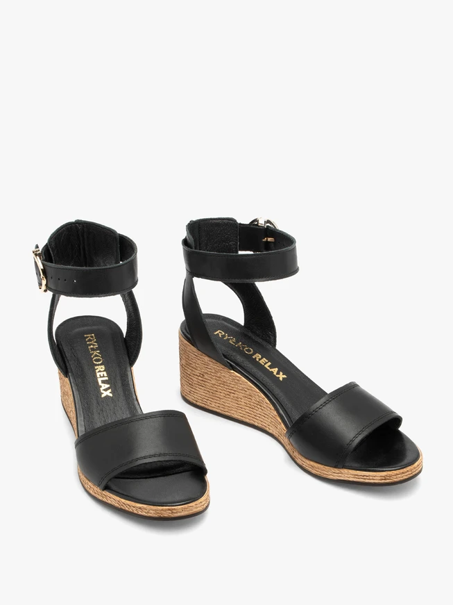 Black women's sandals with a string heel
