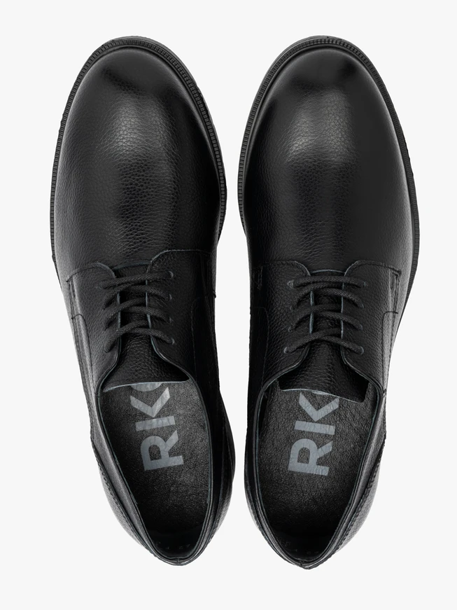 Black men's half shoe on a light bottom