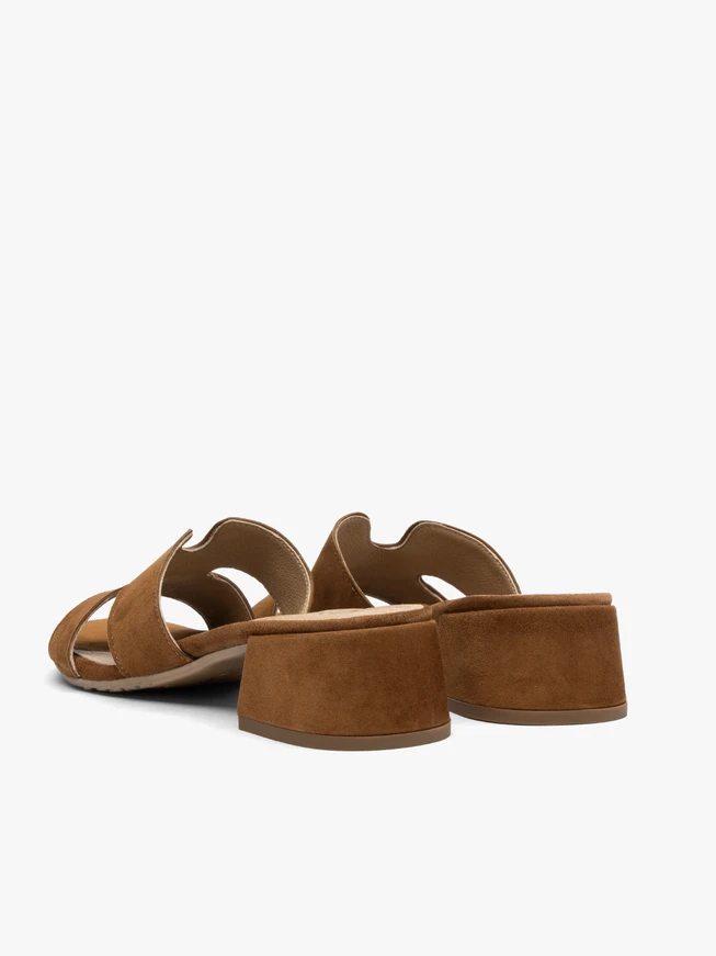 Light brown women’s slides with small heel