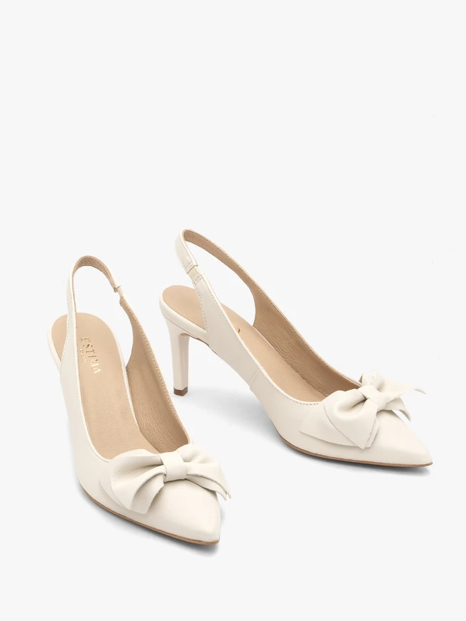 Cream women's heelless slingback pumps with bow