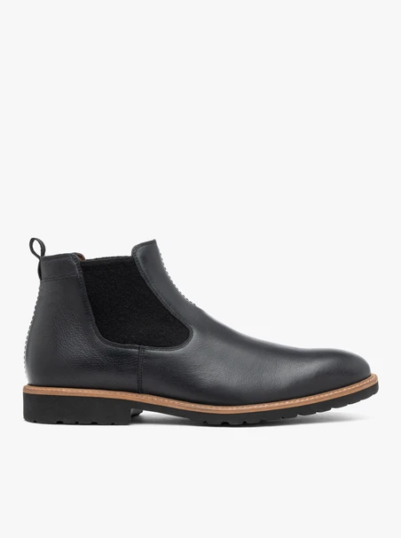Black men’s Chelsea boots with decorative sole