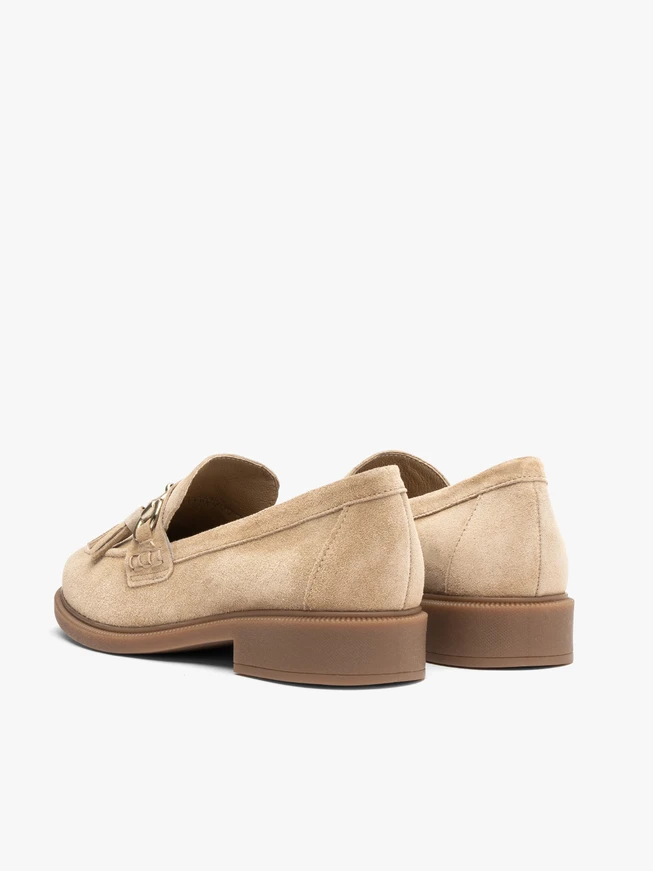 Beige women’s loafers with tassels