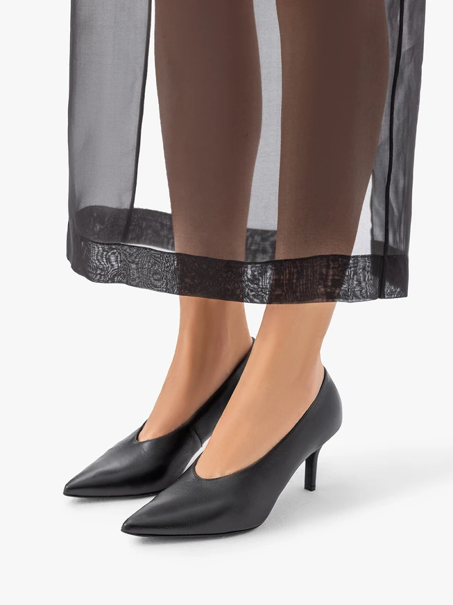Schwarze integrierte Stiletto-Pumps