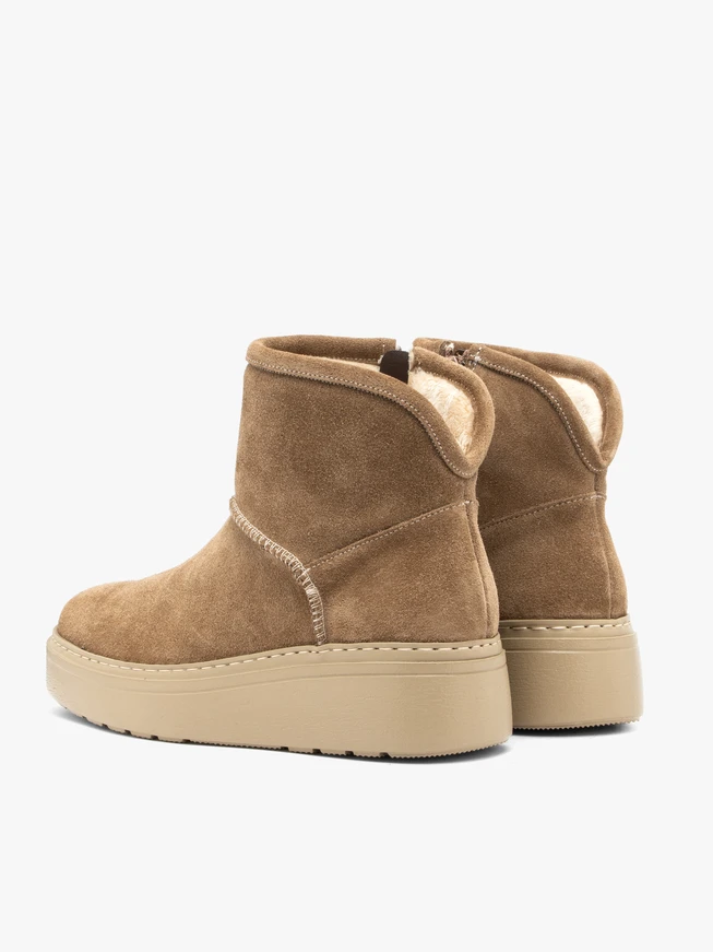 Beige women’s suede snow boots