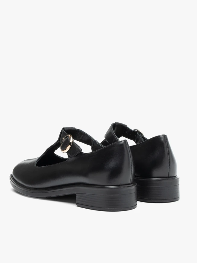 Schwarze T-Bar-Halbschuhe