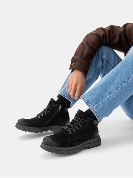 Black chunky-soled men’s ankle boots