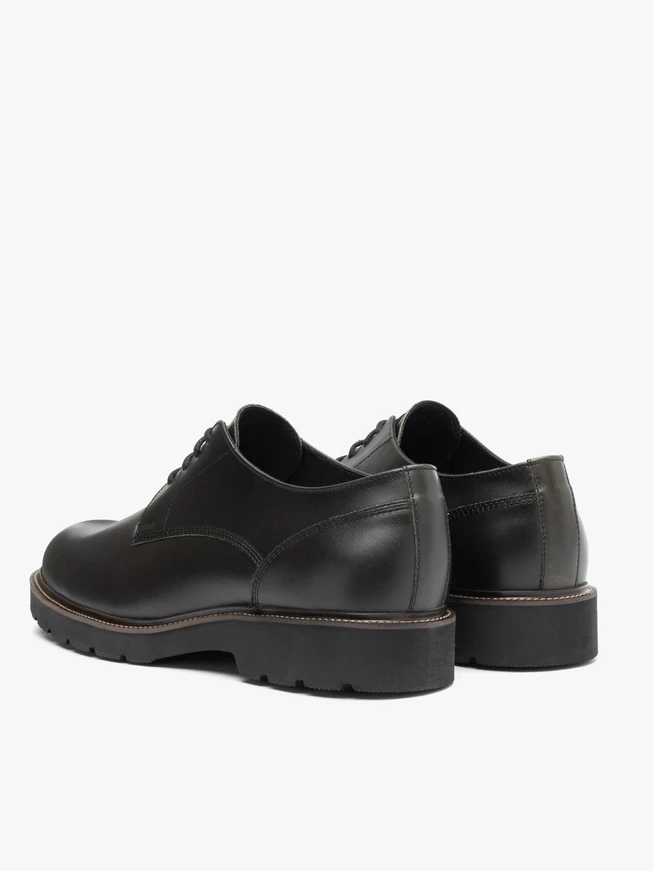 Dunkelgrüne lässige Halbschuhe