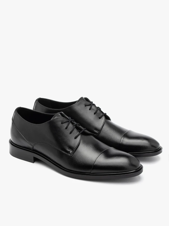 Black shoes with decorative toe