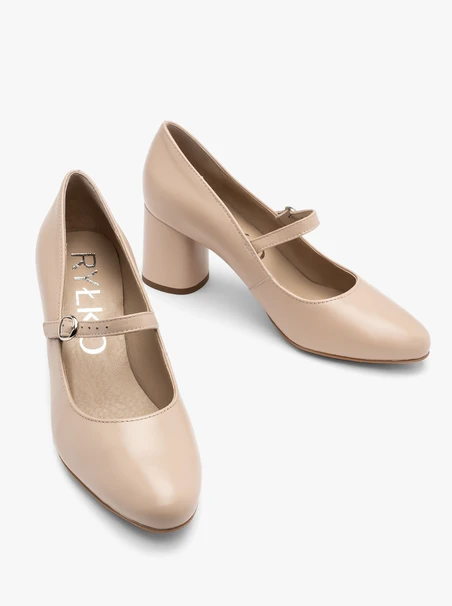 Beige pumps with decorative strap