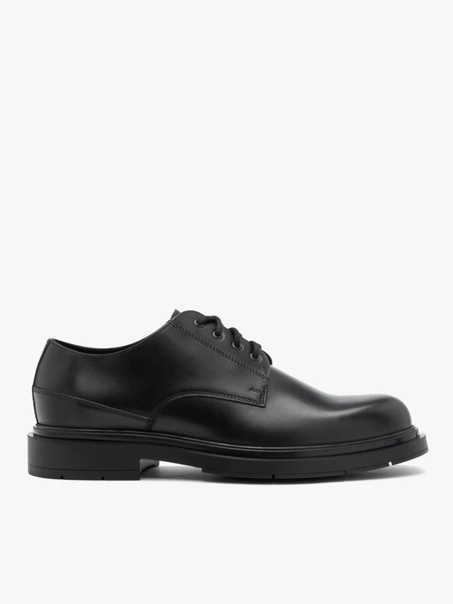 Schwarze Freizeithalbschuhe aus genarbtem Leder