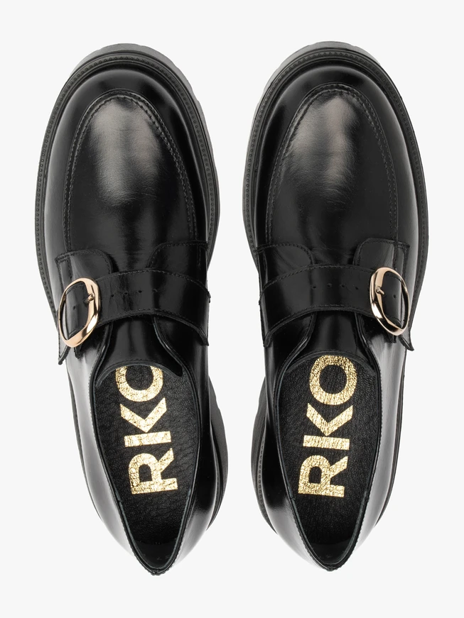 Black slip-on half shoes with buckle