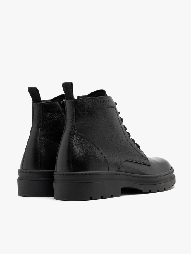 Black men’s boots with logo on the upper
