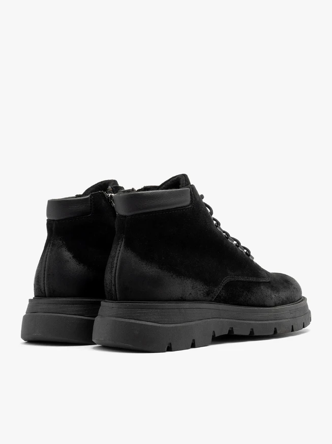 Black chunky-soled men’s ankle boots