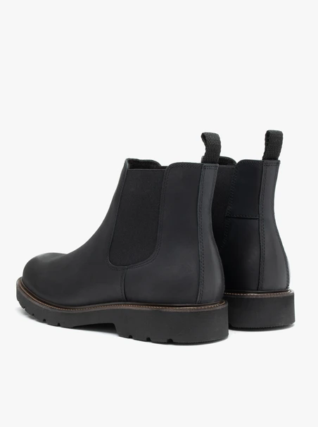 Schwarze Nubukleder-Pantoffeln