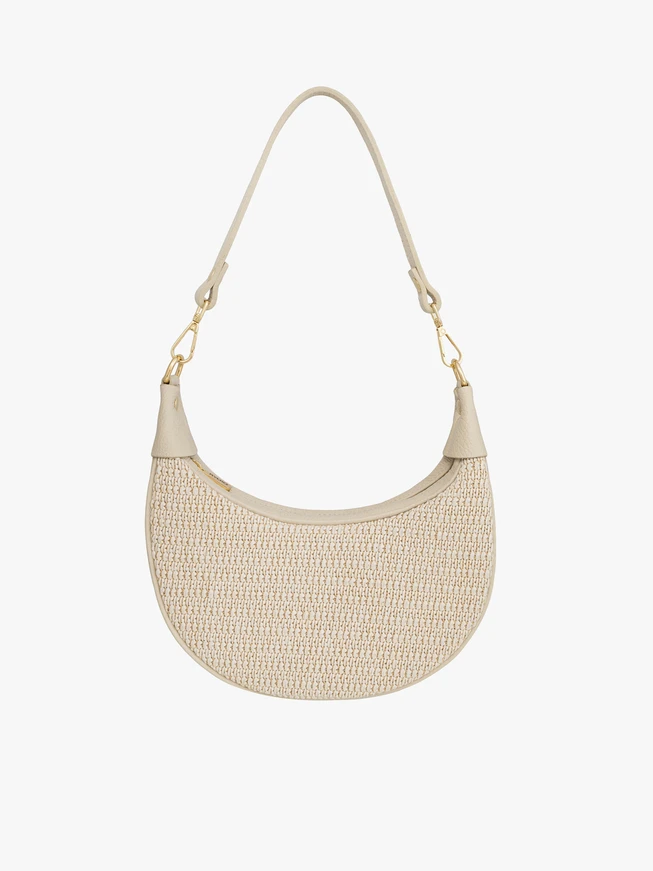 Cremefarbene kleine Handtasche mit interessanter Textur