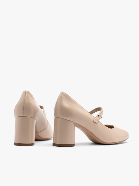 Beige pump with decorative strap
