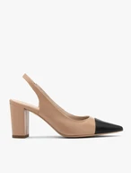 Beige and black pumps