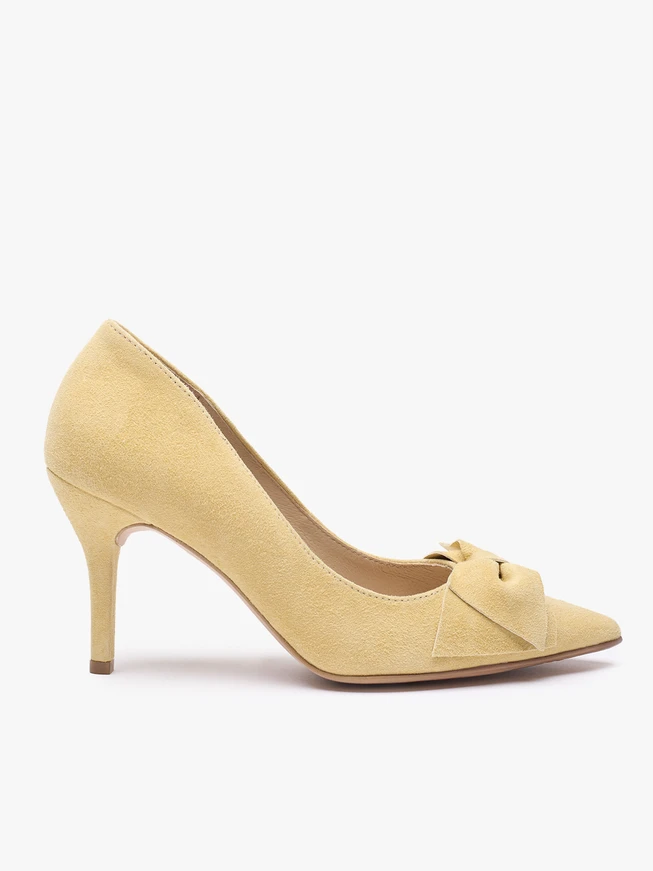 Leuchtend gelbe Pumps mit Schleife und Stilettoabsatz