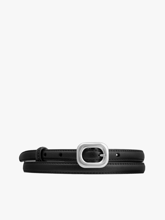 Black women’s leather belt with a silver buckle