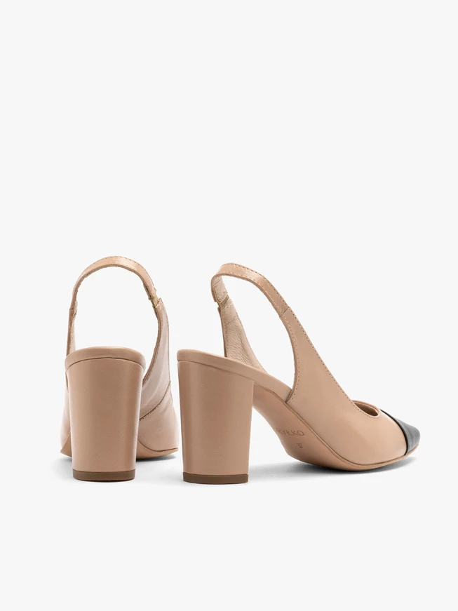 Beige and black pumps