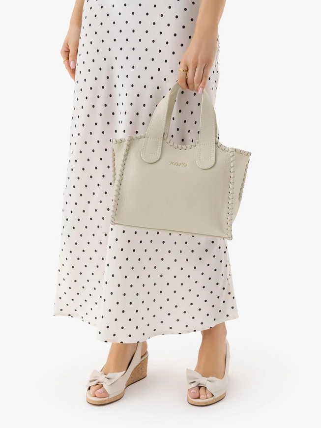 Cremefarbene Lederhandtasche