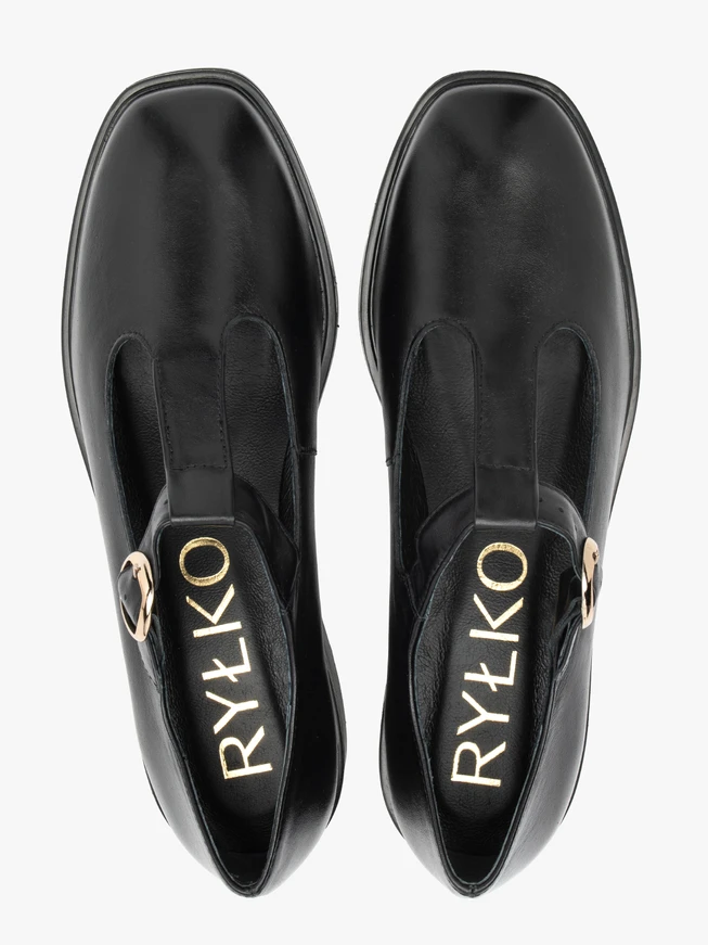 Schwarze T-Bar-Halbschuhe