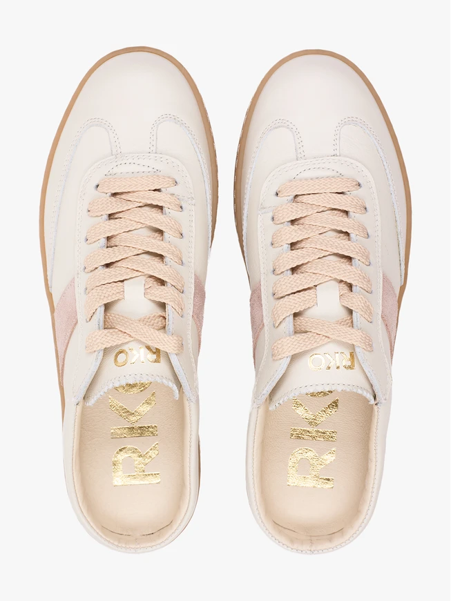 Heillose cremefarbene Turnschuhe