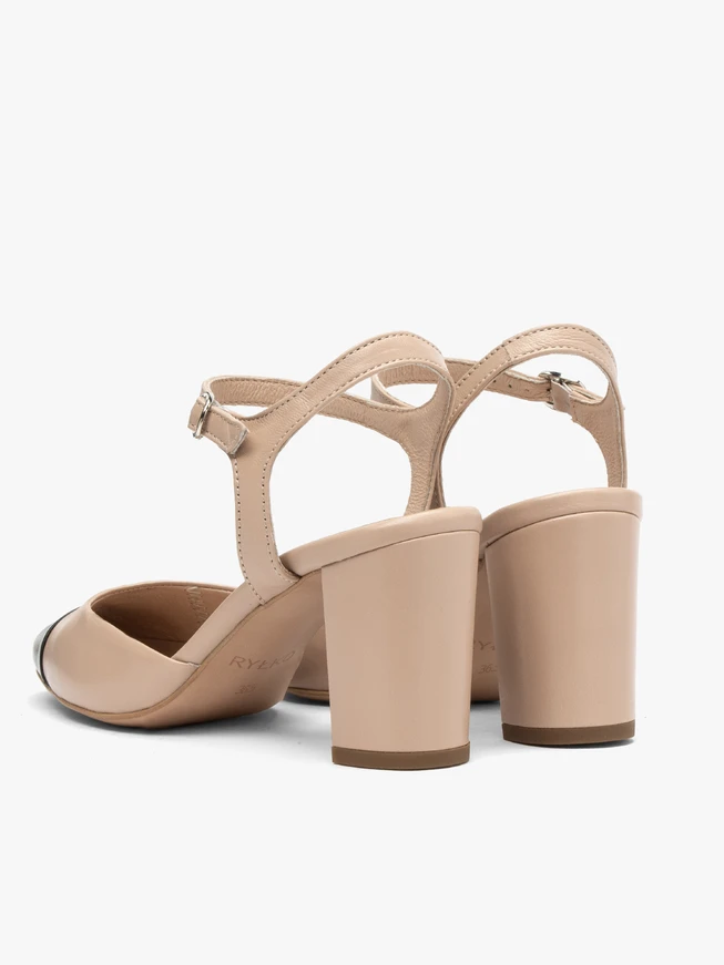 Beige-and-black slingback pumps