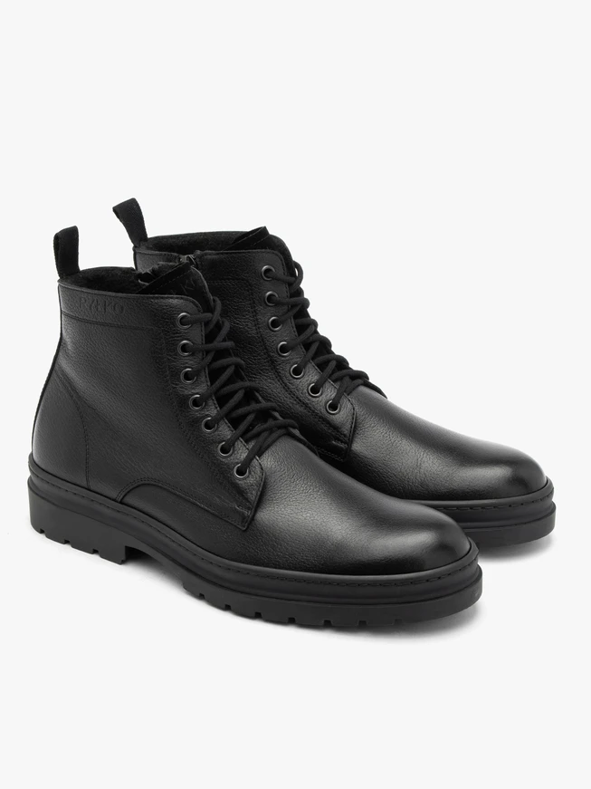 Black men’s boots with logo on the upper