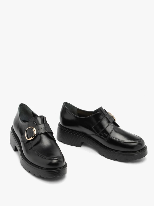 Black slip-on half shoes with buckle