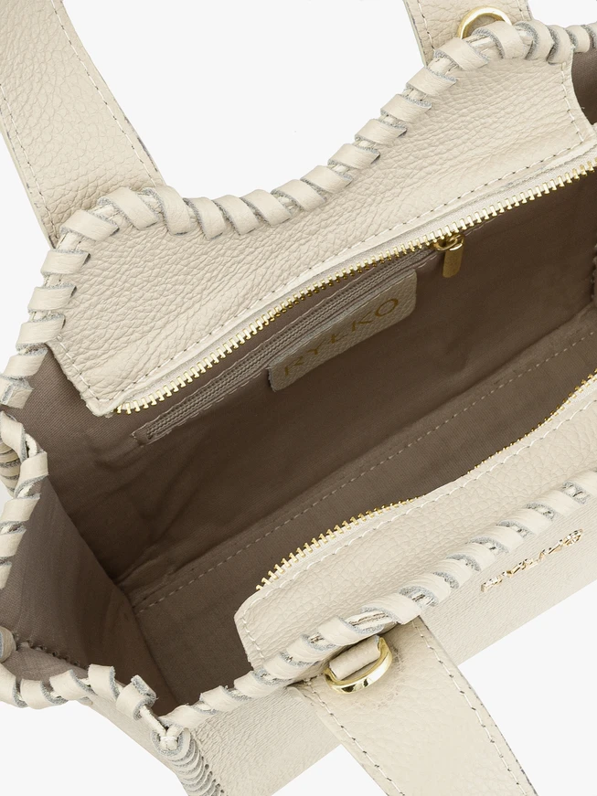 Cremefarbene Lederhandtasche