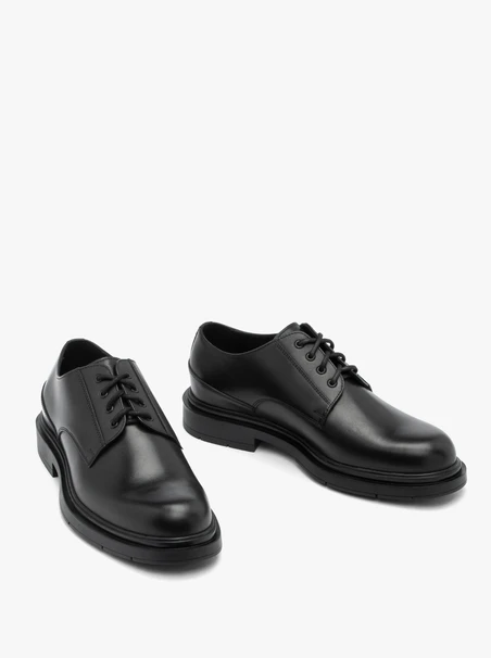 Schwarze Freizeithalbschuhe aus genarbtem Leder