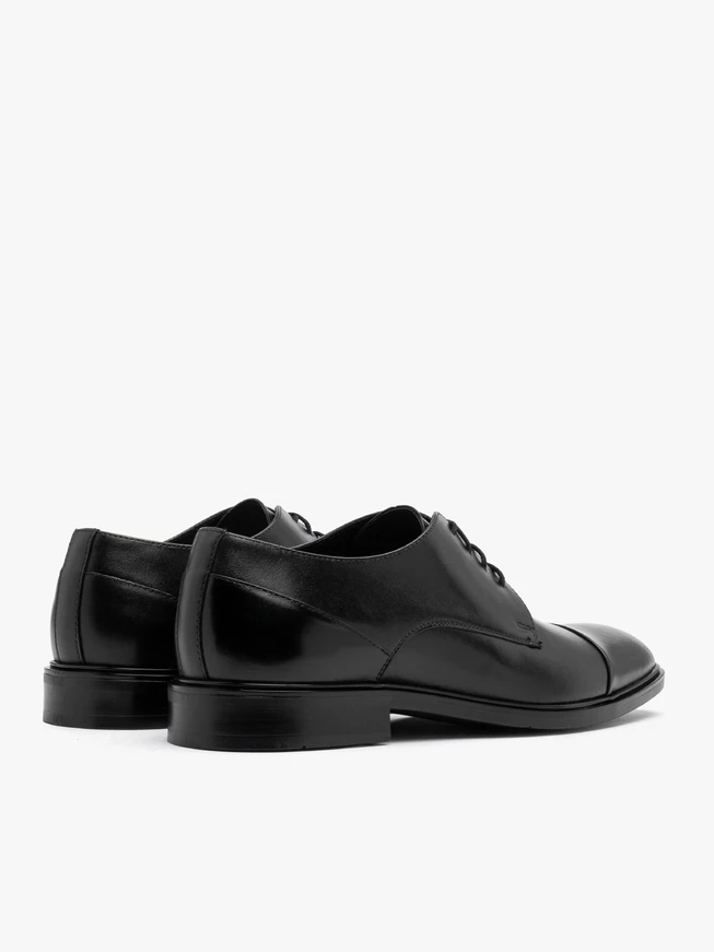Black shoes with decorative toe