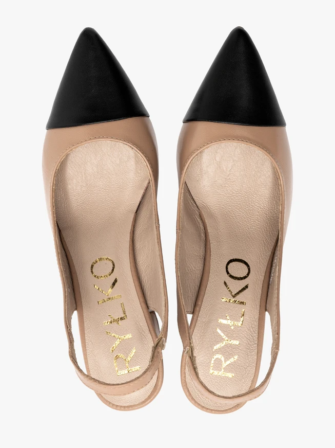 Beige pumps with black toe cap