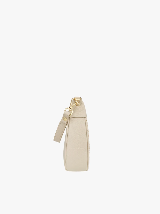 Cremefarbene kleine Handtasche mit interessanter Textur