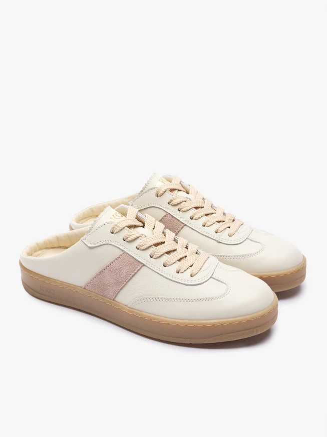 Heillose cremefarbene Turnschuhe