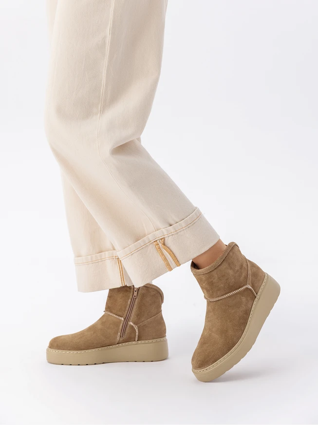 Beige women’s suede snow boots