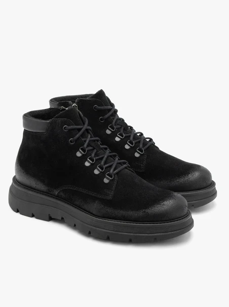 Black chunky-soled men’s ankle boots