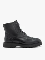 Schwarze Lederstiefel mit Perforationen