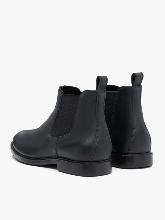 Schwarze Nubukleder-Pantoffeln