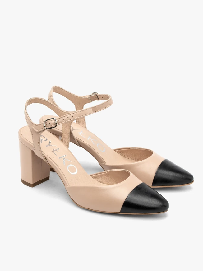 Beige-and-black slingback pumps