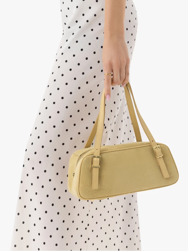 Leuchtend gelbe Baguettetasche