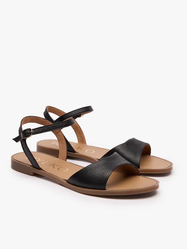 Schwarze flache Sandalen