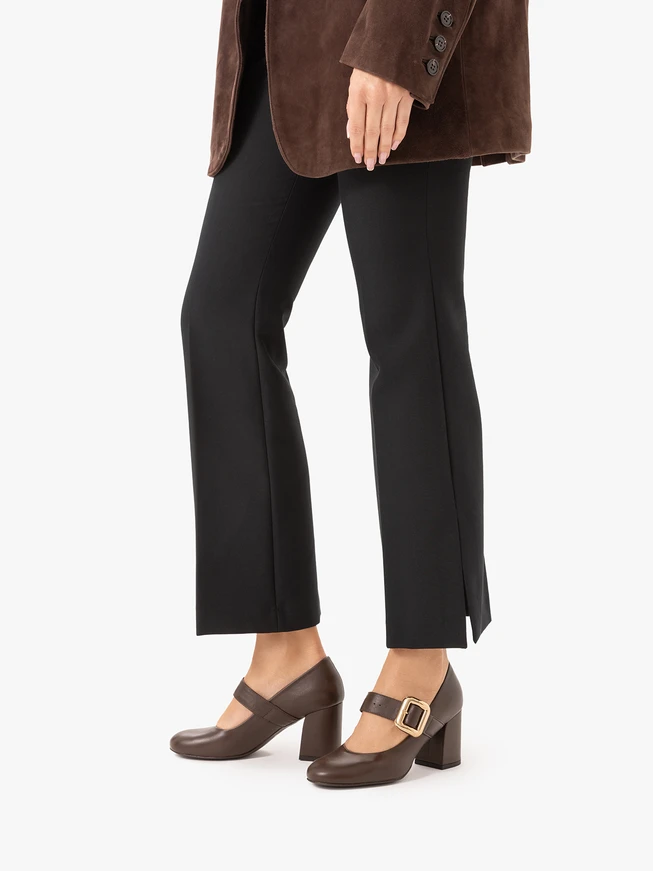 Brown pumps with a striking buckle