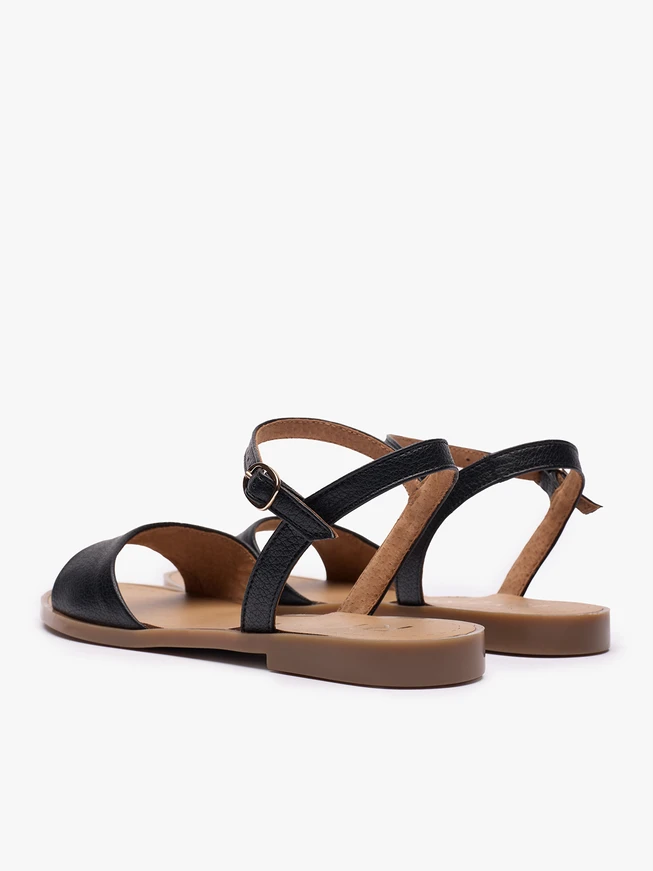 Schwarze flache Sandalen