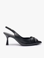 Schwarze absatzlose Slingback-Pumps mit Blumenverzierung