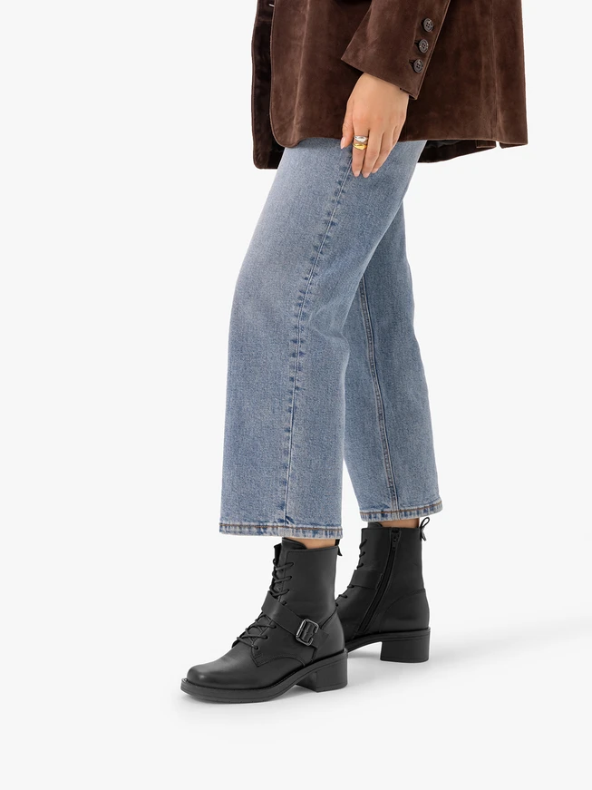 Black buckle sneakers